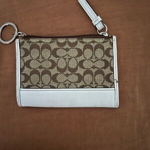 Coach mini cloth and white Leather 2”by 3” case with key ring.